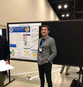 Alper Adak with his research poster.